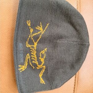 Vintage Arc'teryx Knit Beanie with Yellow dead bird logo.